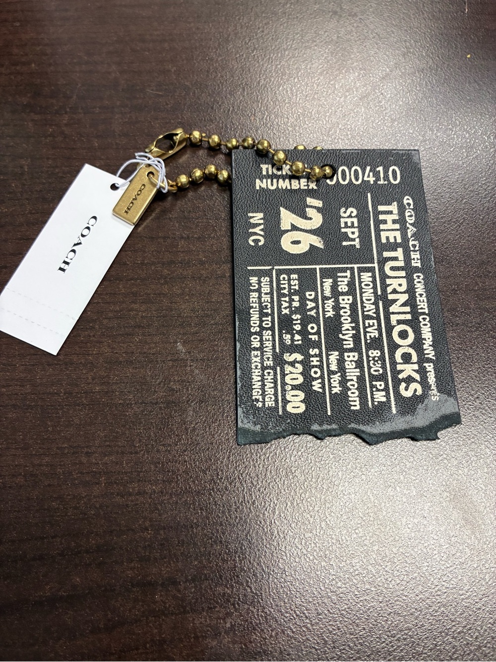 The Coach bag charm NWT